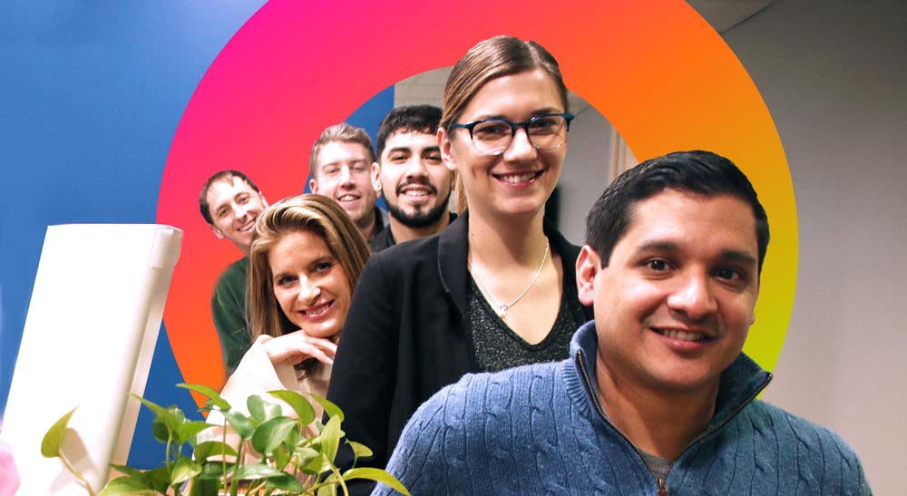Row of employees smiling