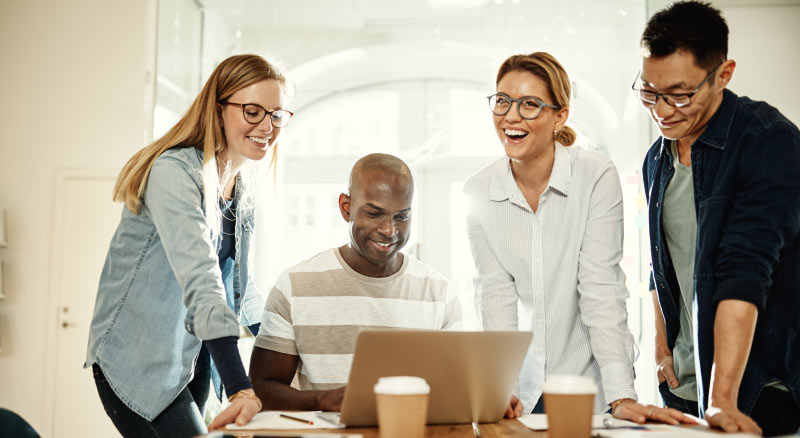 People looking at laptop