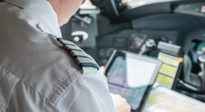 Pilot in cockpit on airplane