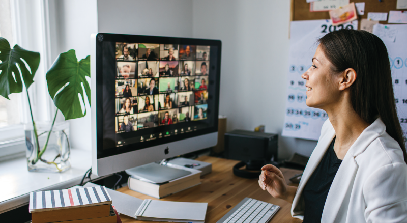 Woman remote conferencing with team