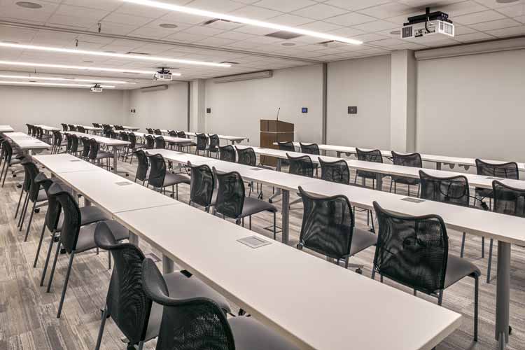 Training room and classroom setup with combined and separate audio and video zones