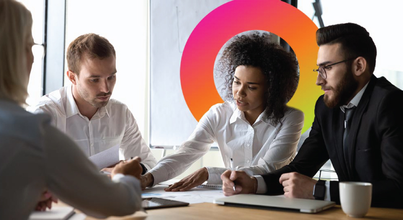 Two women and two men in a meeting