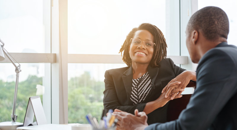 Businessman and woman meeting