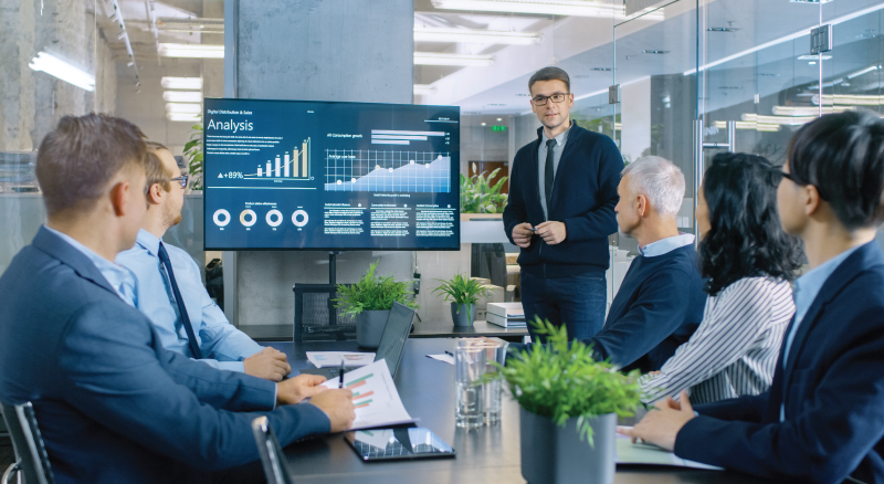 Man presenting to meeting