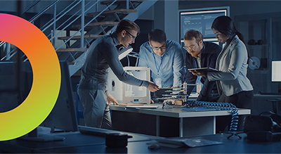 Multiple individuals working in an office setting