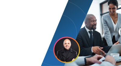 A business meeting with diverse professionals seated around a conference table, engaged in discussion and collaboration.