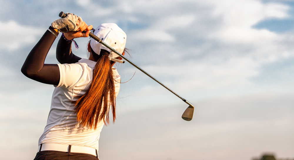 Woman Golfing