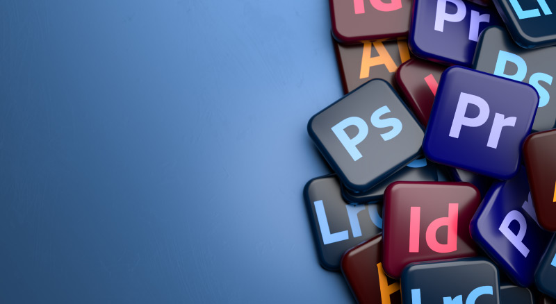 A collection of colorful Adobe software suite icons on a blue background
