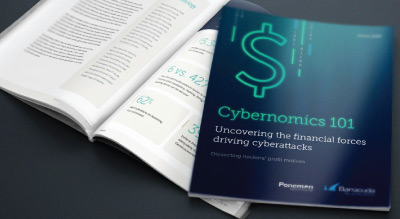 Open book with left page filled with text and right page featuring a cover titled ‘Cybernomics 101’ with a dollar sign symbol, subheading ‘Uncovering the financial forces driving cyberattacks,’ and logos for ‘Ponemon’ and ‘Flourish’.