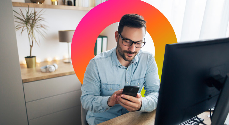 Man working on phone in office