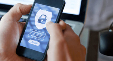 Two hands holding a cellphone with a padlock displayed on the screen