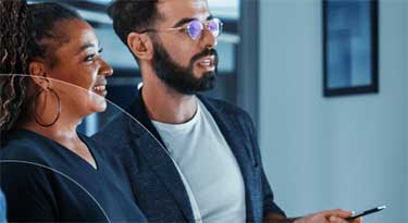 Woman and male clicking through presentation