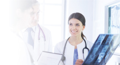 Woman doctor holding xray