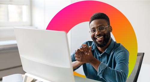 three coworkers in front of laptops