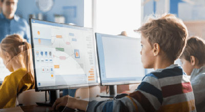 Student working on computer in classroom