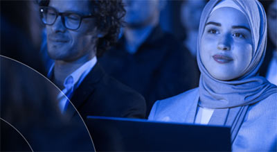 Woman sitting infront of computer in a session