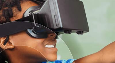 close up of african american boy with vr headset on
