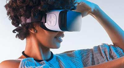 African American woman wearing VR headset