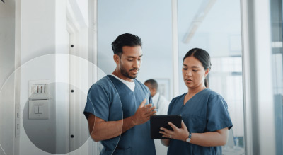 Two healthcare workers talking