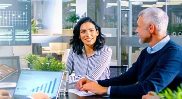Itam managed services banner woman and man in ofice