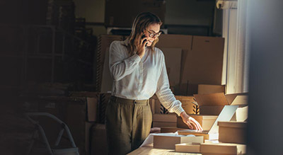 Woman on phone leading us commercial insurance provider case study thumbnail