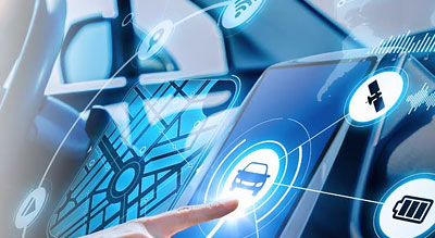 Hand touches a holographic car dashboard display
