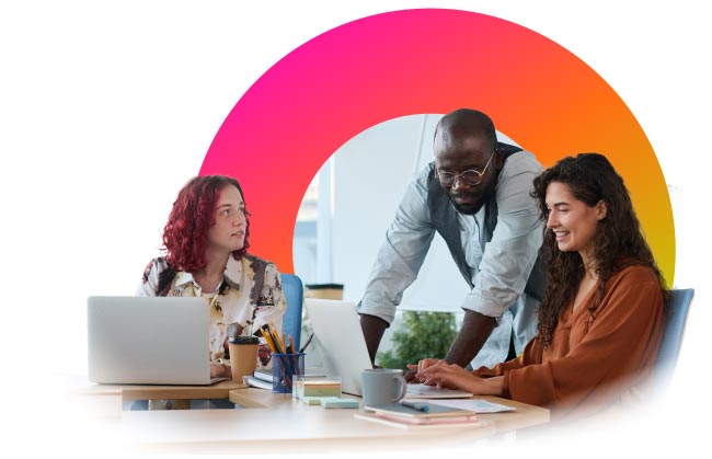 people collaborating in front of laptops