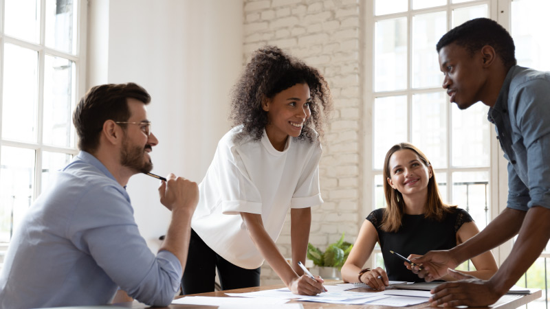 company workers listening to employee