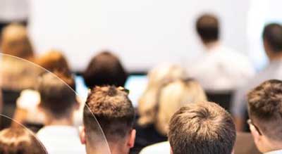 People sitting in a lecture setting