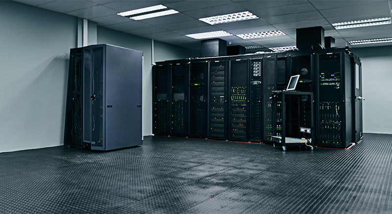 A large data center with multiple server racks