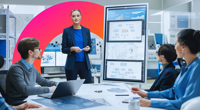 A woman giving a presentation in an office