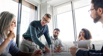 People having a meeting around a table