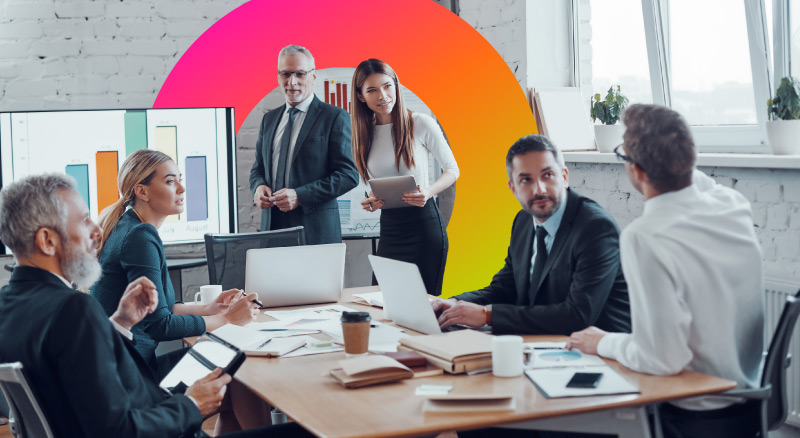 A group of people in a meeting in a modern office space