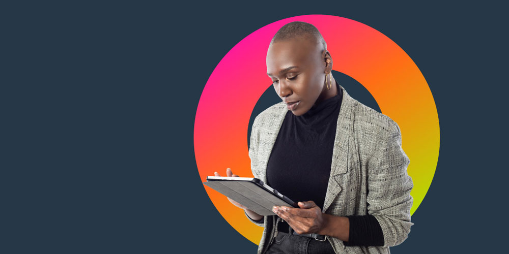 An individual using a handheld digital tablet