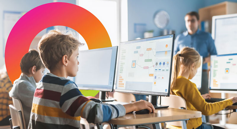 Children using computer programs in a classroom