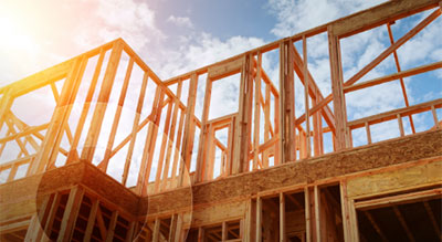 A foundation at a construction site, featuring equipment and materials for upcoming building projects