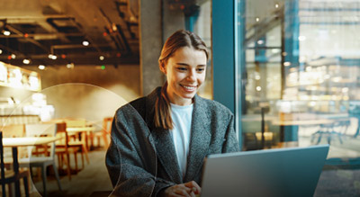 An employee working on a laptop