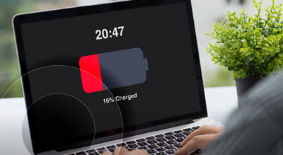 Two people using stylists to edit graphs on a digital tablet