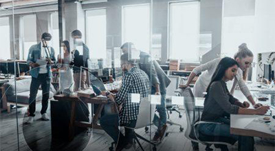 Group of individuals working collaboratively in an office setting