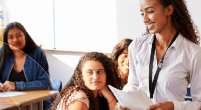 A group of people in a classroom setting