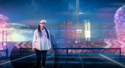Woman using VR headset with a cyber overlay of a city background