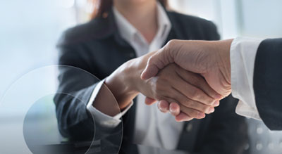 Two people shaking hands