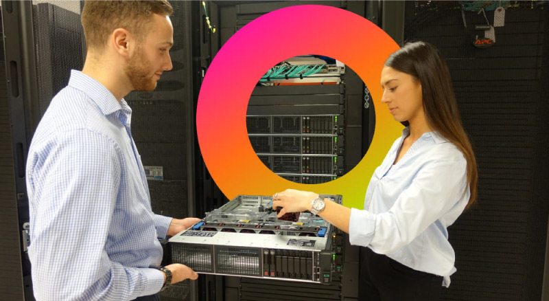Two employees working on server