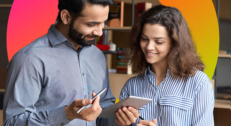 A specialists reviews data with an employee